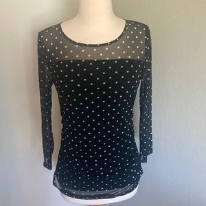 Woman’s lined polka dot top gently worn once. Size M INC.